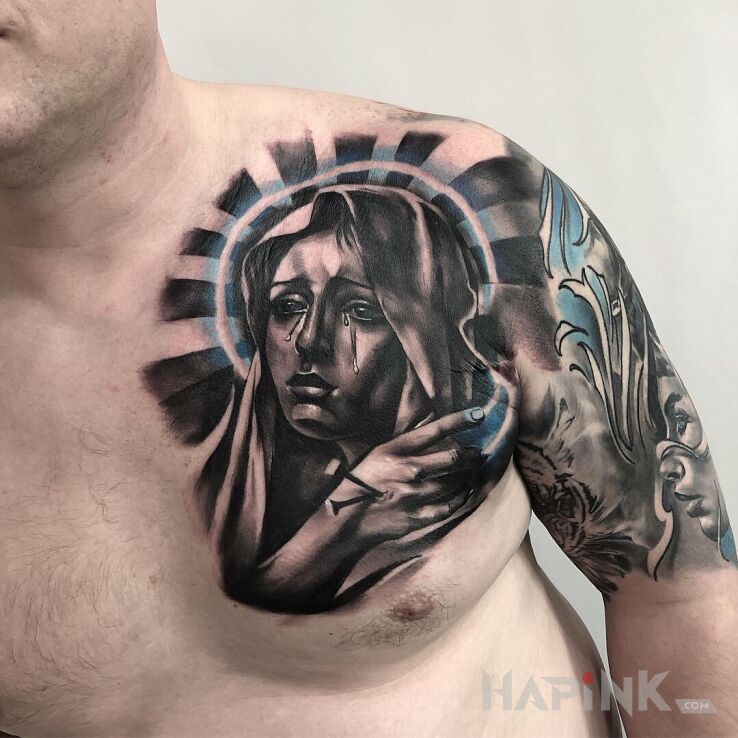 Tattoo Maria in black and gray motif and realistic style on the chest
