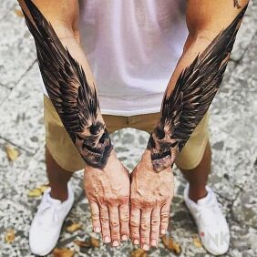 Tattoo Winged skulls on the forearm motif: 3D style: realistic