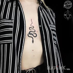Tattoo Between the breasts on the chest motif: sexy style: minimalistic