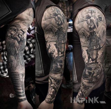 Tattoo Łowca potworów in characters motif and realistic style on the upper arm