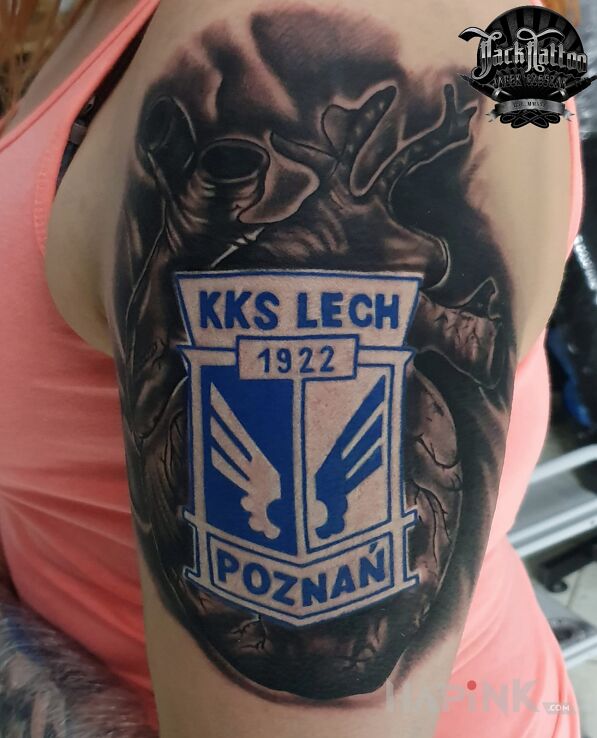 Tattoo Zawsze wierny in other motif and realistic style on the upper arm