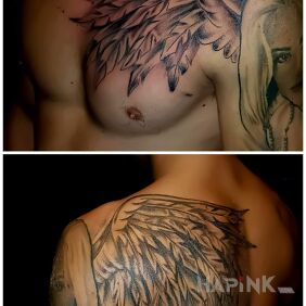 Tattoo Angel on the chest motif: wings style: graphic / illustrative