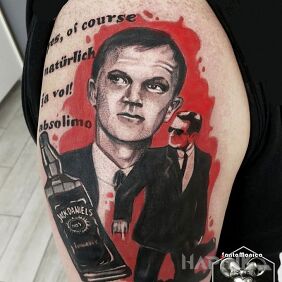 Tattoo Jurek on the upper arm motif: lettering style: realistic