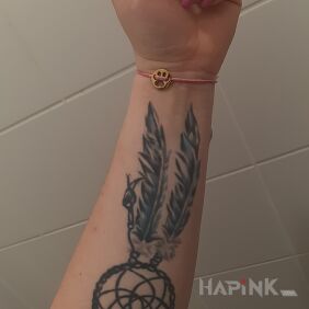 Tattoo Dream catcher on the forearm motif: objects style: graphic / illustrative