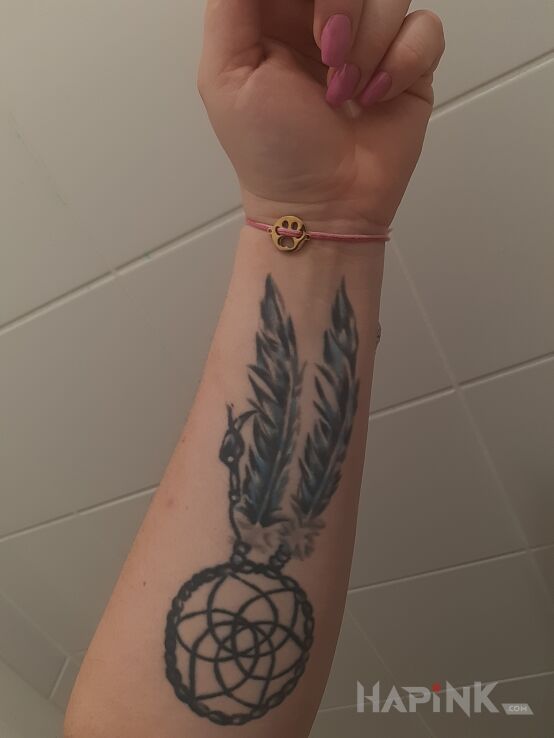 Tattoo Łapacz snów in black and gray motif and graphic / illustrative style on the forearm