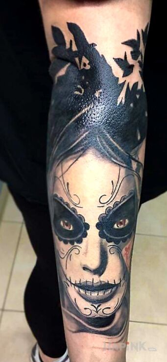 Tattoo Santa Muerte? in santa muerte motif and realistic style on the forearm