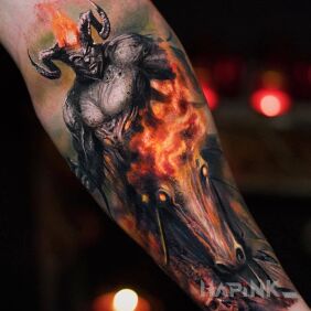 Tattoo God of War on the forearm motif: animals style: realistic