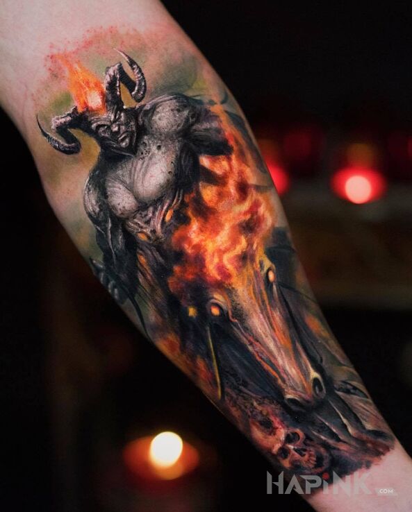 Tattoo Bóg Wojny in characters motif and realistic style on the forearm