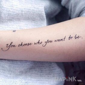 Tattoo Life choice on the forearm motif: lettering style: calligraphy