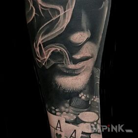 Tattoo Smoke in the casino on the forearm motif: casino style: realistic