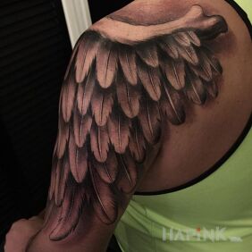 Tattoo Wing on the upper arm motif: other