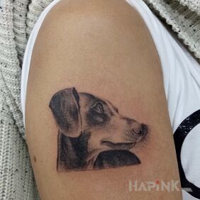 Tattoo Dog. on the upper arm motif: animals style: graphic / illustrative