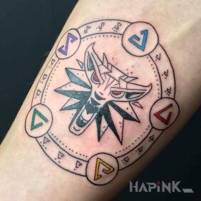 Tattoo The Witcher on the forearm motif: colorful style: graphic / illustrative