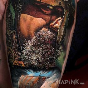 Tattoo Viking on the high seas on the leg motif: faces style: realistic