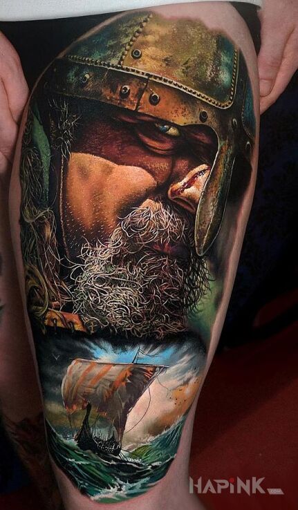 Tattoo Wiking na pełnym morzu in faces motif and realistic style on the leg