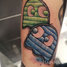 Tattoo PacMan Souls on the forearm motif: colorful style: embroidered