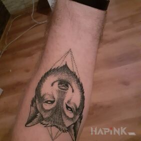Tattoo Wolf on the forearm motif: animals style: graphic / illustrative