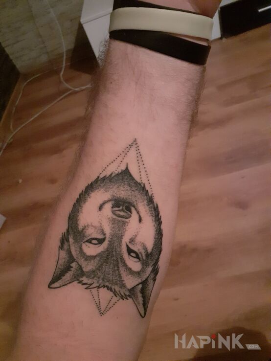 Tattoo Wilk in black and gray motif and graphic / illustrative style on the forearm