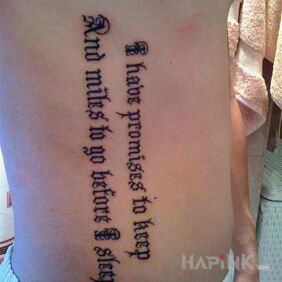 Tattoo Rhyming inscription on the ribs motif: lettering