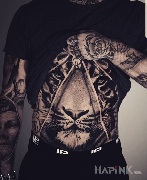 Tattoo Spokojny Tygrys in animals motif and realistic style on the stomach