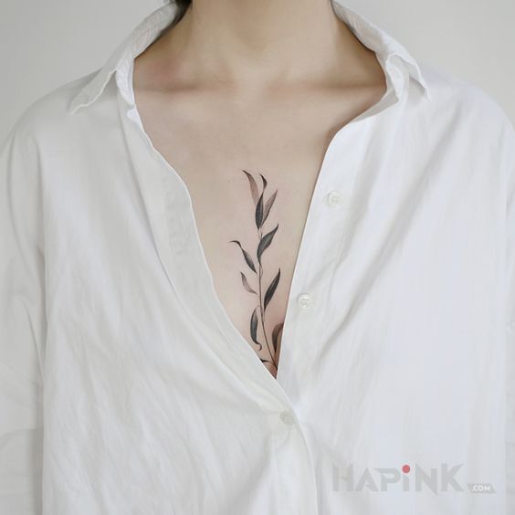 Tattoo Gałązka in black and gray motif and graphic / illustrative style on the chest