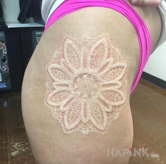 Tattoo Biały tusz in mandalas motif and white ink style on the leg