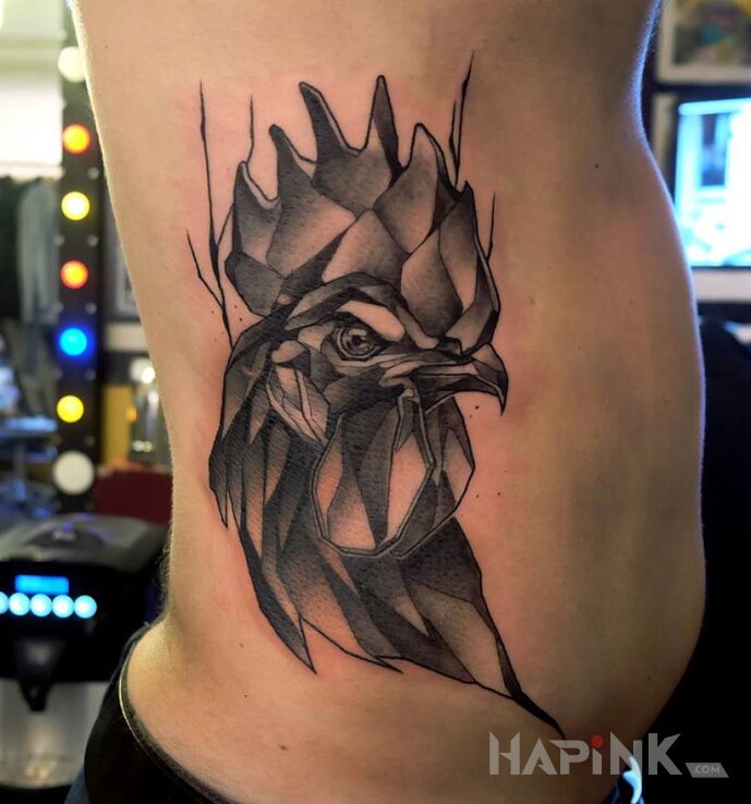 Tattoo Kogut in animals motif on the ribs