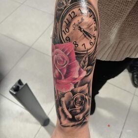 Tattoo Name Son and time of birth on the forearm motif: flowers style: realistic