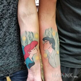 Tattoo The mermaid and the prince on the forearm motif: characters style: cartoon / comic book