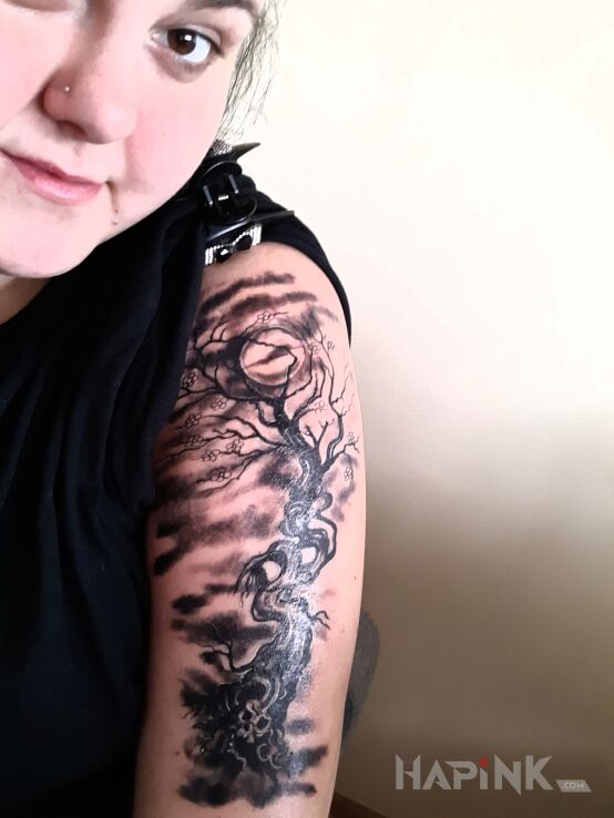 Tattoo Kwiat wiśni.  Kończymy rękaw ? in black and gray motif and graphic / illustrative style on the upper arm