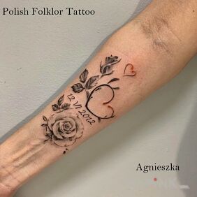 Tattoo Love on the forearm motif: flowers style: realistic