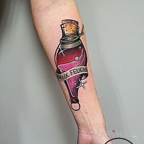 Tattoo Harry Potter - Felix Felicis on the forearm motif: colorful style: graphic / illustrative