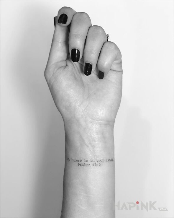 Tattoo Moja przyszlość in lettering motif and calligraphy style on the wrist