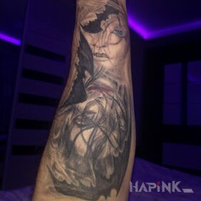 Tattoo Women and dark birds on the forearm motif: black and gray style: graphic / illustrative