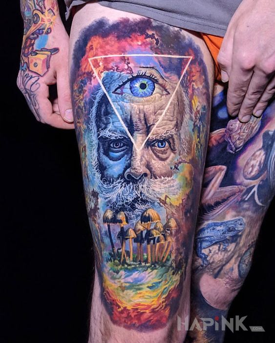 Tattoo Eksplozja kolorów in colorful motif and surrealistic style on the leg