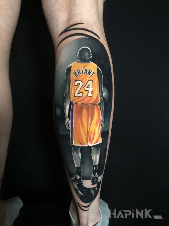 Tattoo Black mamba in black and gray motif and realistic style on the calf