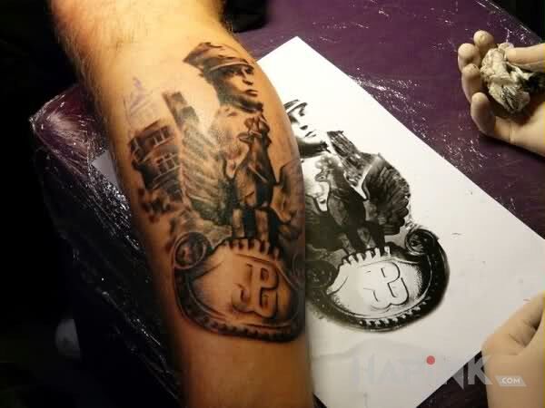 Tattoo Polski żołnierz in patriotic motif on the forearm