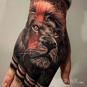 Tattoo Prince on the hand motif: animals style: realistic