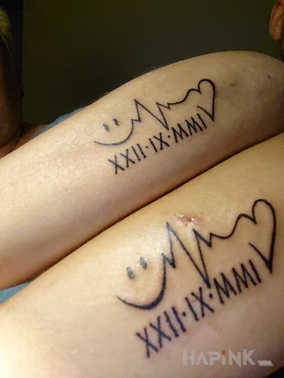Tattoo Mój i mej miłości in Love motif and minimalistic style on the forearm
