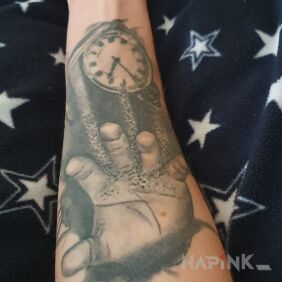 Tattoo Sand on the forearm motif: black and gray style: realistic