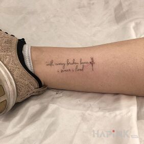 Tattoo Broken bone on the leg motif: lettering style: calligraphy