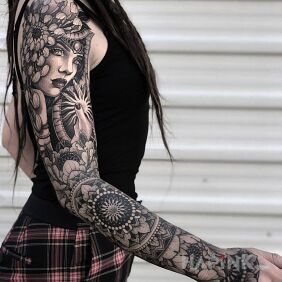 Tattoo Graphic and geometric sleeve on the hand motif: black and gray style: graphic / illustrative