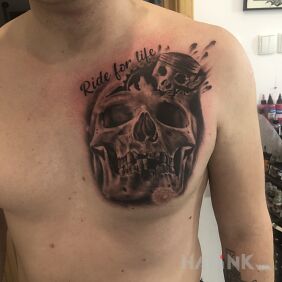 Tattoo Skull with moto motif on the chest motif: 3D style: realistic