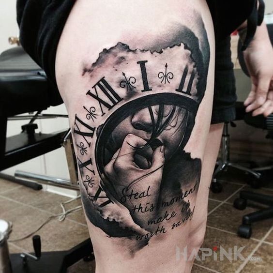 Tattoo Kradzież momentu in black and gray motif and graphic / illustrative style on the leg
