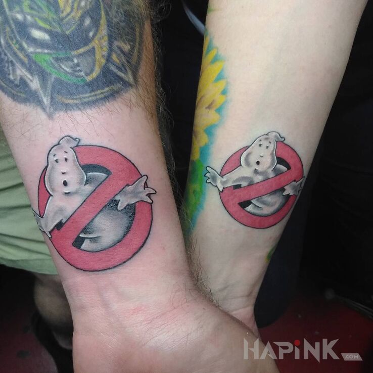 Tattoo Ghostbusters in colorful motif and graphic / illustrative style on the wrist