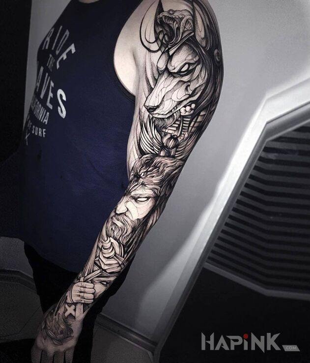Tattoo Graficzny rękaw in faces motif and sketch style on the forearm