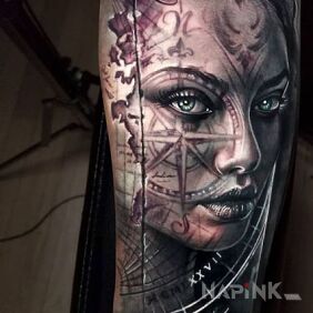 Tattoo Compass on the face on the forearm motif: black and gray style: realistic