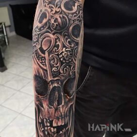 Tattoo Skull and Crossbones on the forearm motif: 3D style: Celtic / Nordic