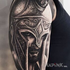 Tattoo Warrior's head on the upper arm motif: faces style: realistic