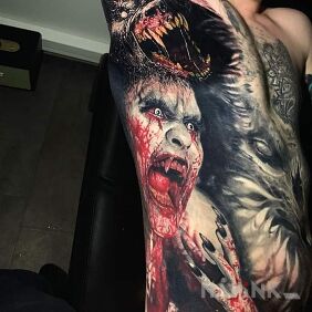 Tattoo Bloodthirsty beasts on the ribs motif: black and gray style: realistic